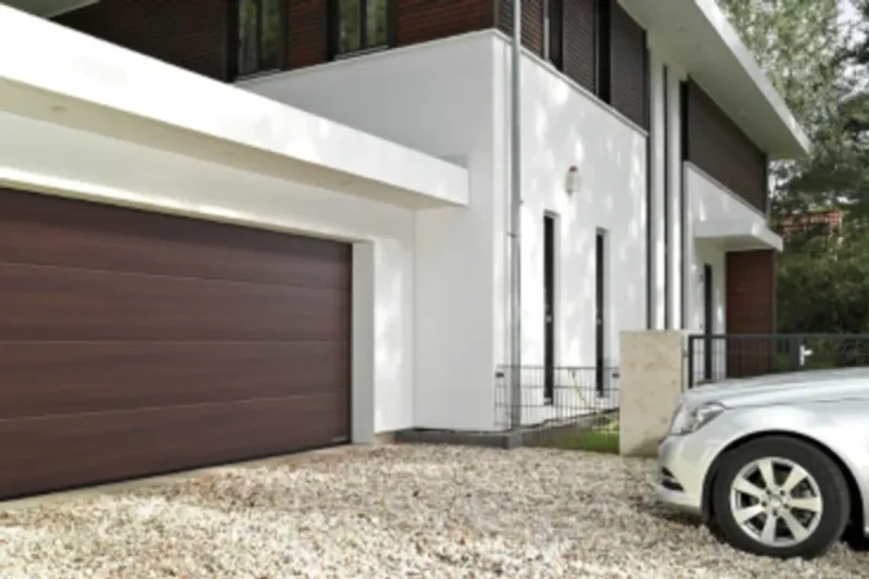 White electric roller garage door fitted by Rollrite