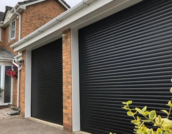 Roller garage door being installed by Rollrite